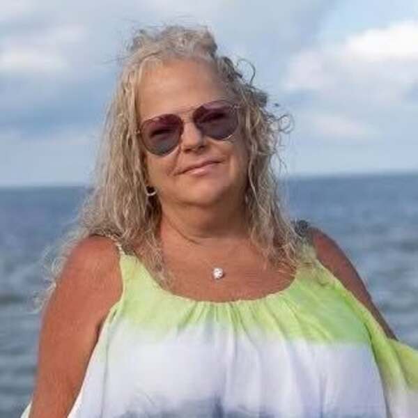 Melanie Grossi — American Merchant Services